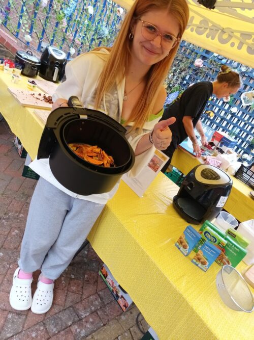 Alysha learning to cook sweet potato fries