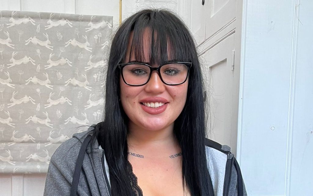 Ex resident Millie smiling at the camera