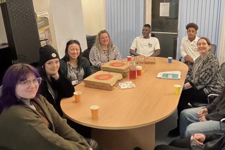 Youth Council during their meeting sat around a table