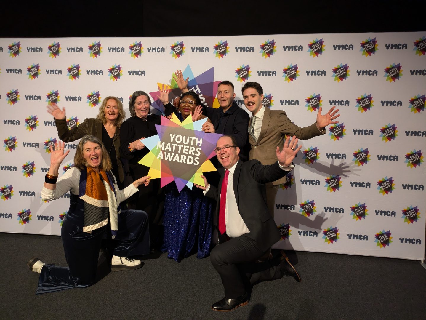 Chaplaincy nominees on stage holding a Youth Matter Awards sign